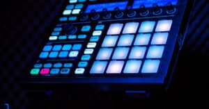 Close-up of illuminated music production controller